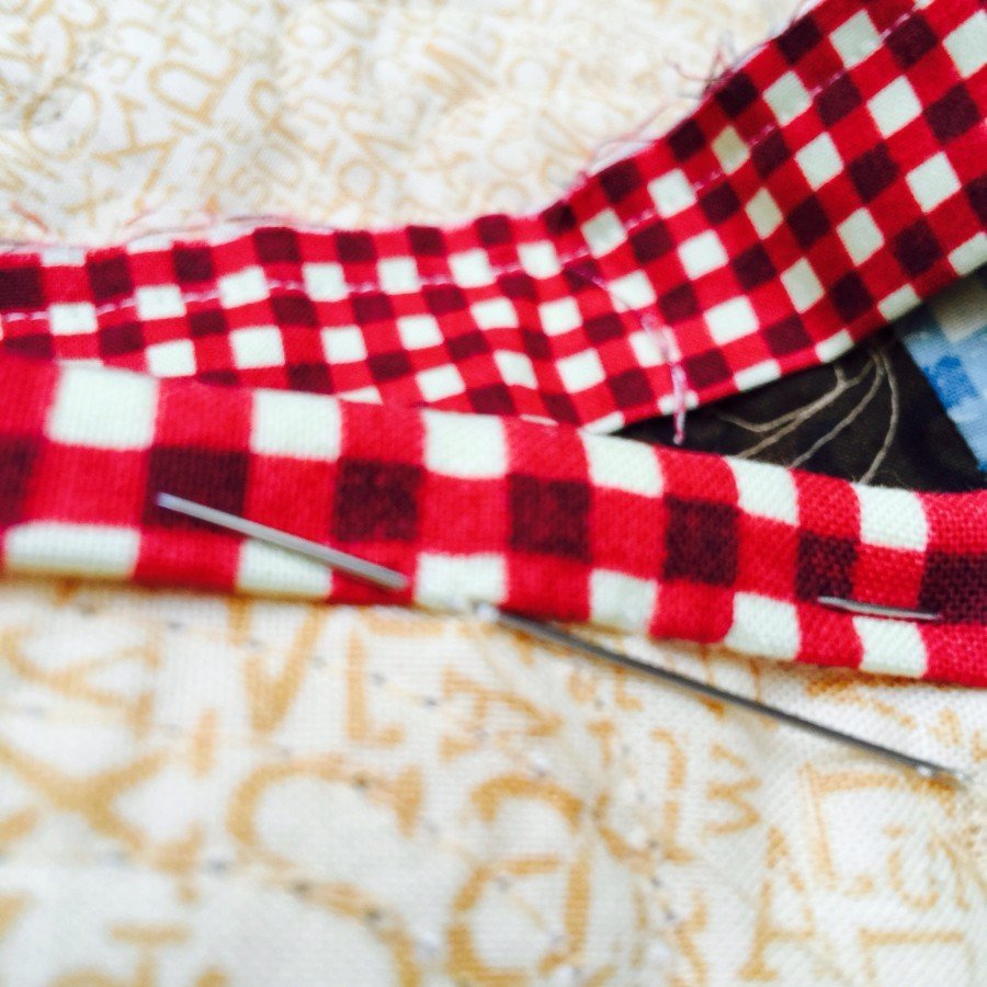 Hand Sewing the Binding on a Quilt Tutorial