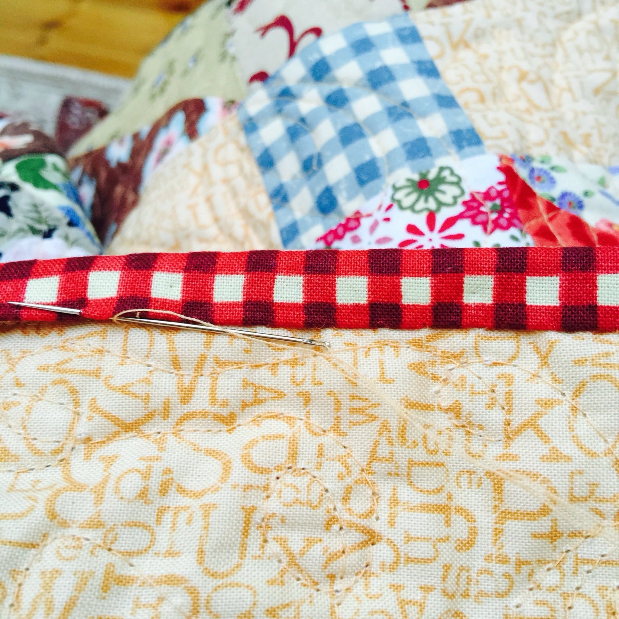 Hand Sewing the Binding on a Quilt Tutorial