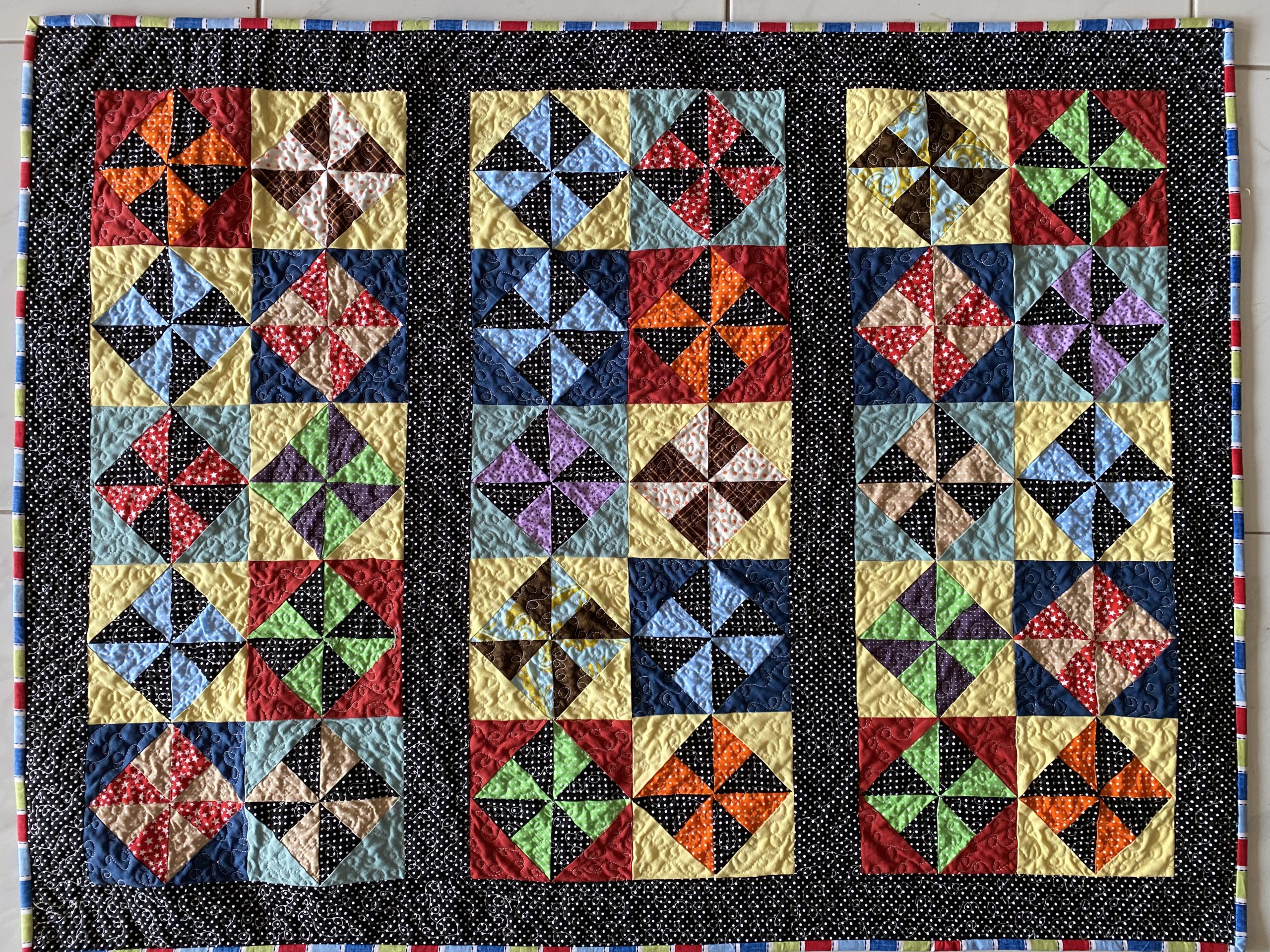 Glowing Pinwheels Quilt and Pattern (not quite Amish) - susies-scraps.com